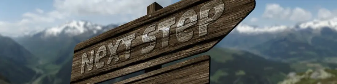A sign saying Next Steps