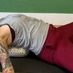 Woman in supta baddha konasana